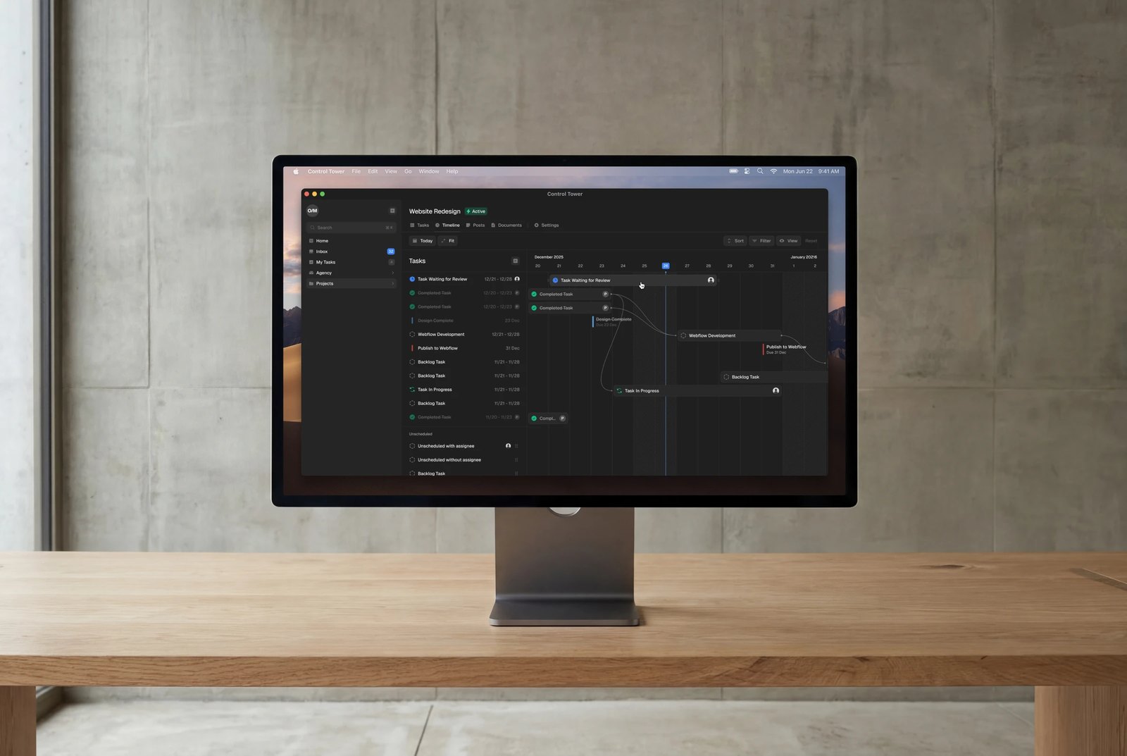 Control Tower app open on a desktop monitor on a wooden desk