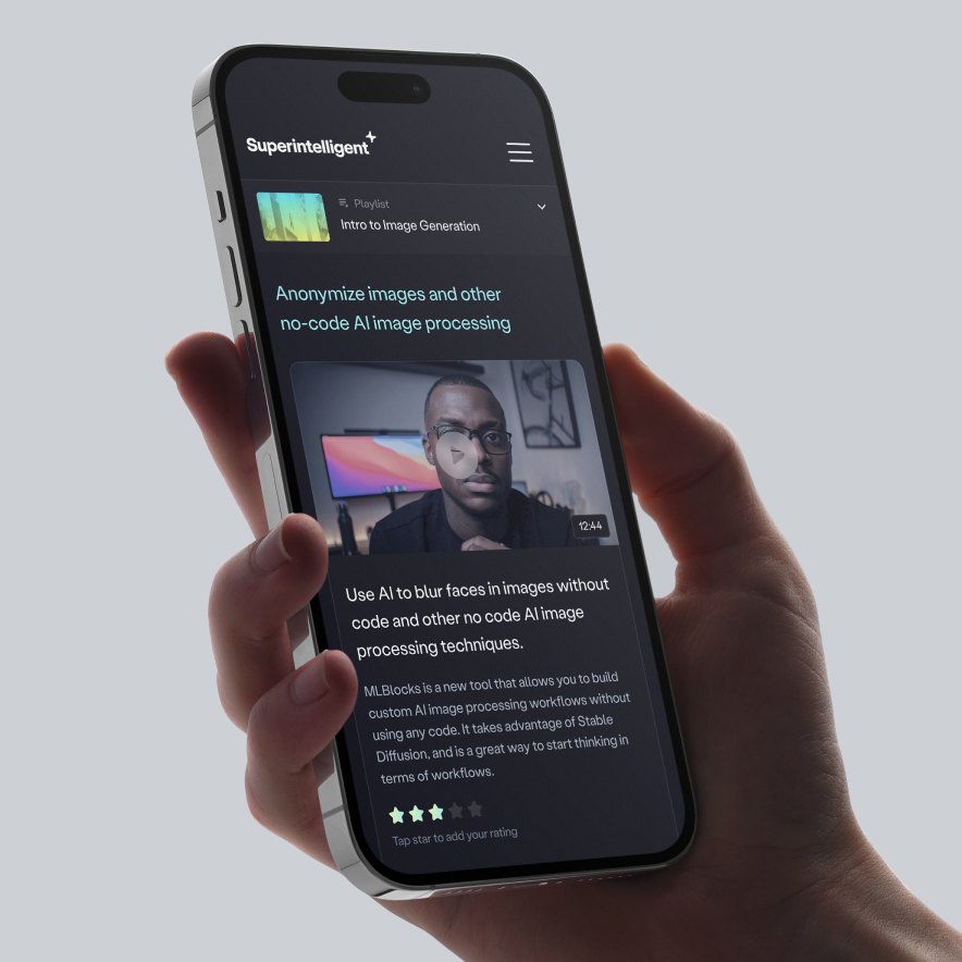 Hand holding a phone showing the mobile app